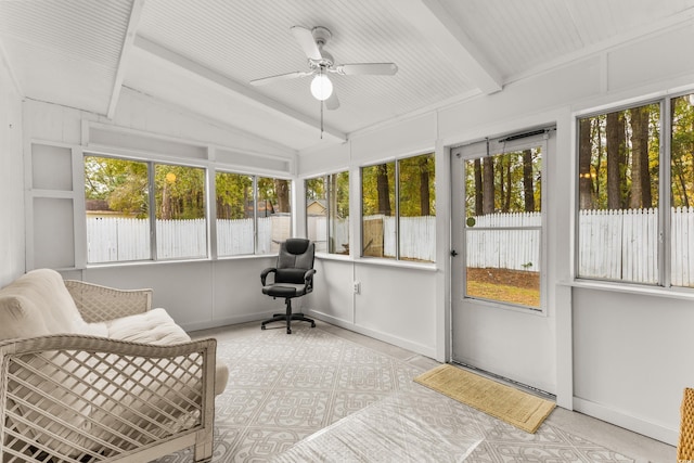 sunroom / solarium with lofted ceiling with beams and ceiling fan