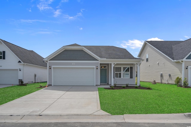 1200 NW Calabash Station Blvd, Calabash, NC 28467 - ranch-style house featuring a garage, a front yard, and concrete driveway