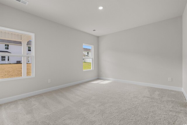1200 NW Calabash Station Blvd, Calabash, NC 28467 - carpeted spare room featuring baseboards and recessed lighting