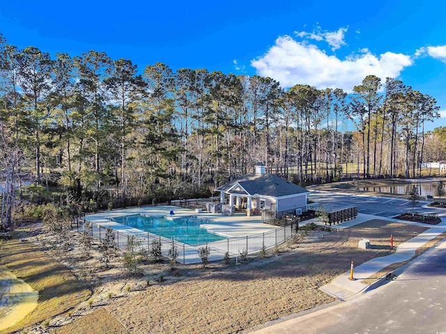 view of pool with a patio, fence, and a fenced in pool