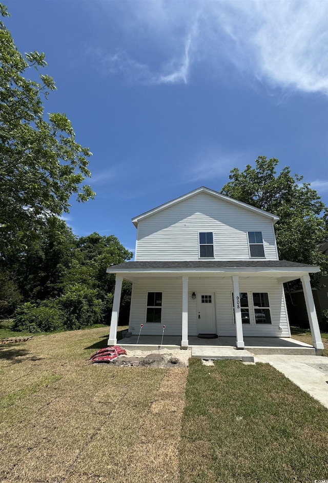 view of front of house with a front lawn