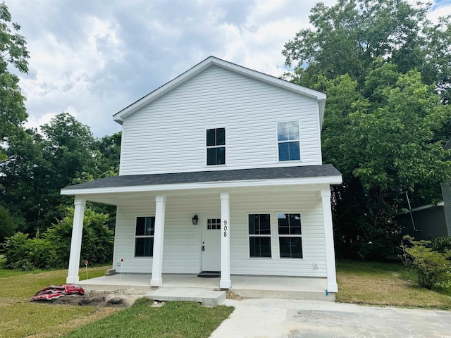 view of front of house with a front lawn