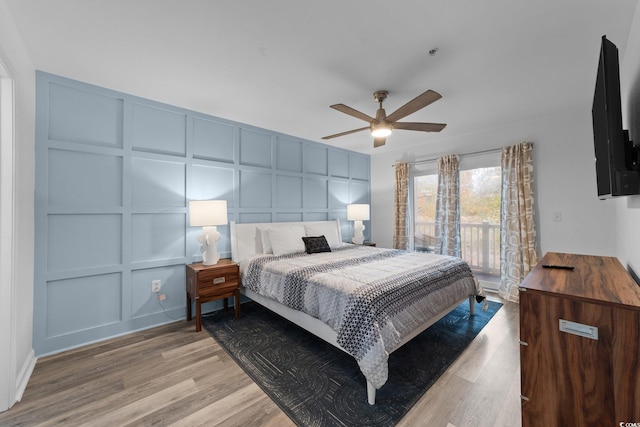 bedroom with ceiling fan and light wood-type flooring