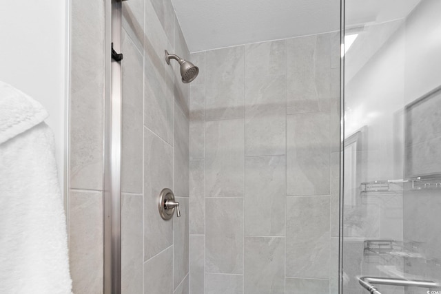 bathroom with an enclosed shower