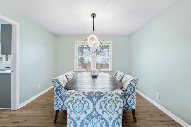 dining room featuring dark wood-type flooring