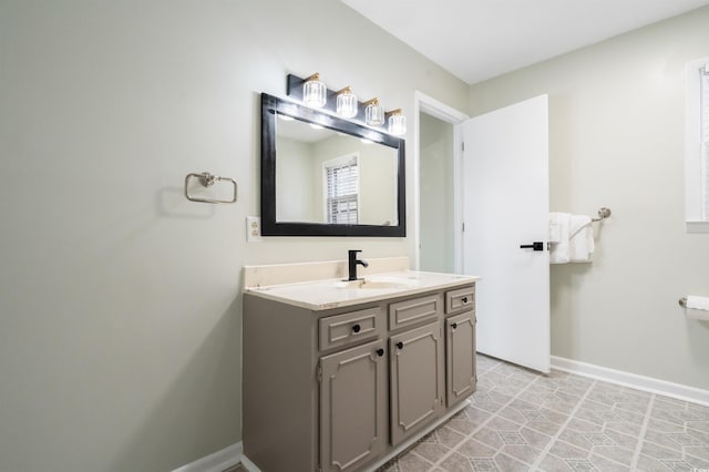 bathroom featuring tile patterned floors and vanity