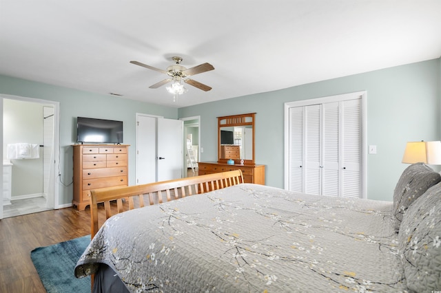 bedroom featuring ceiling fan, hardwood / wood-style floors, and ensuite bathroom