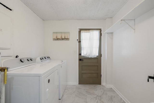 washroom with separate washer and dryer