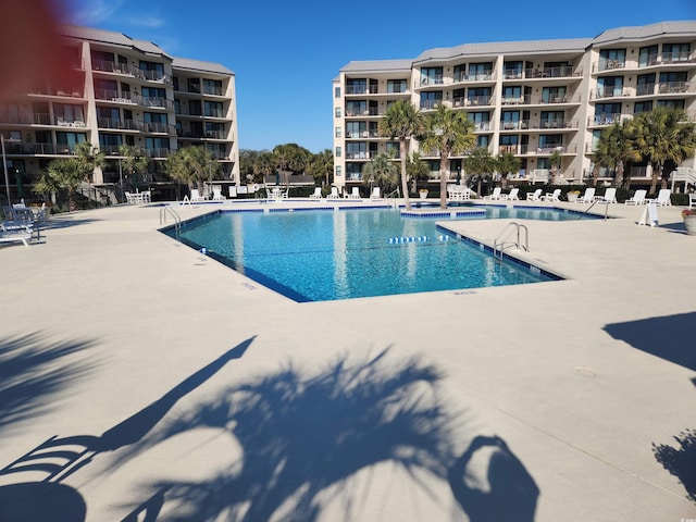 view of pool with a patio area