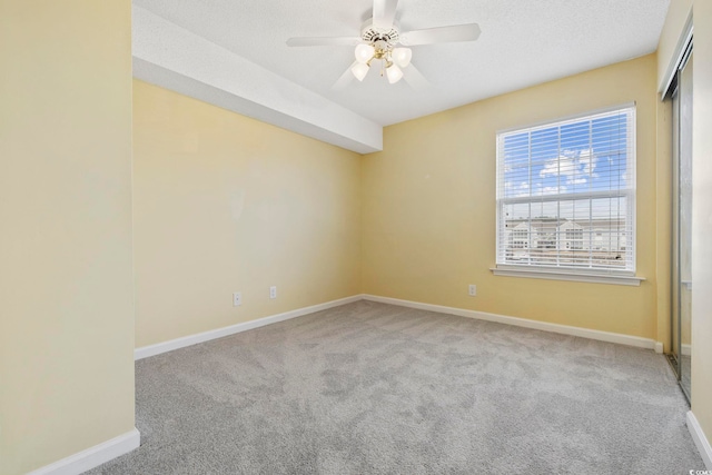 8830 Chandler Dr Unit E, Myrtle Beach, SC 29575 - empty room with carpet, baseboards, and ceiling fan