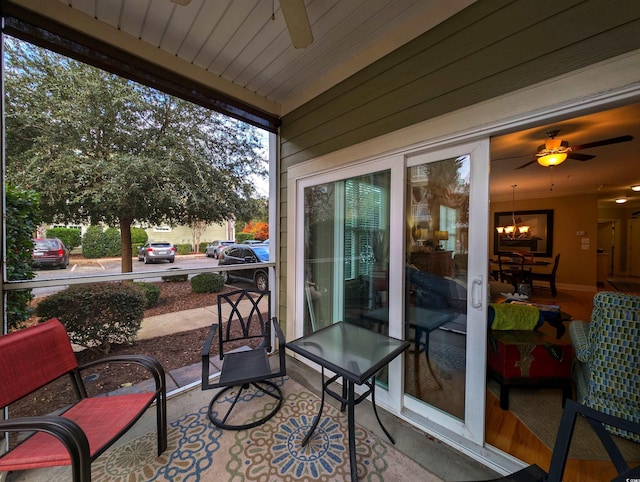 exterior space featuring ceiling fan