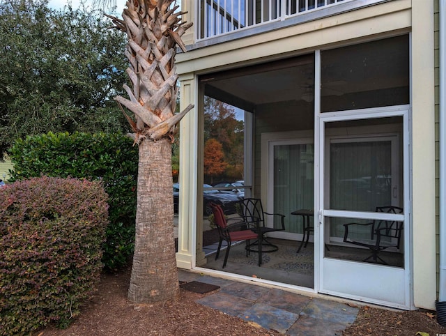 view of patio / terrace with a sunroom