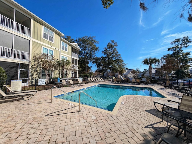 view of pool with a patio