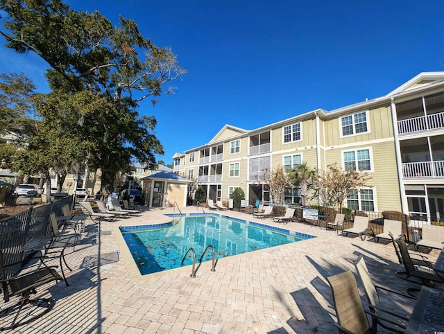 view of pool featuring a patio