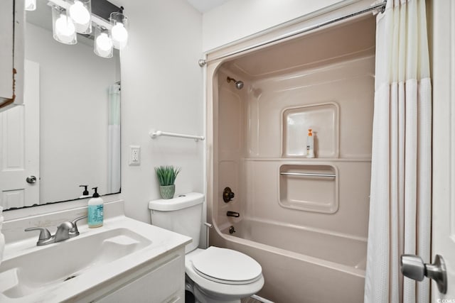 full bathroom featuring vanity, toilet, and shower / tub combo