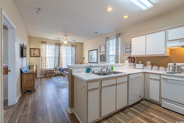 1310 River Oaks Dr Unit 2J, Myrtle Beach, SC 29579 - kitchen with white appliances, a peninsula, a sink, plenty of natural light, and recessed lighting