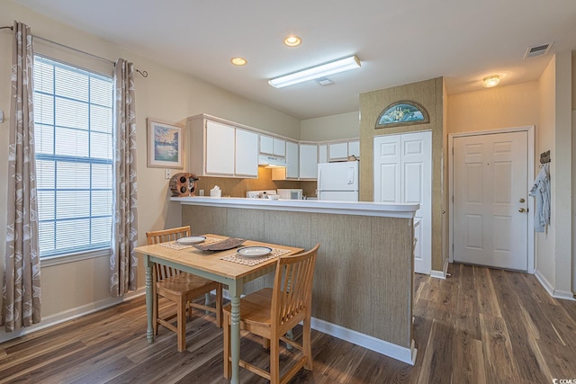 dining room with visible vents, baseboards, recessed lighting, and dark wood-style flooring