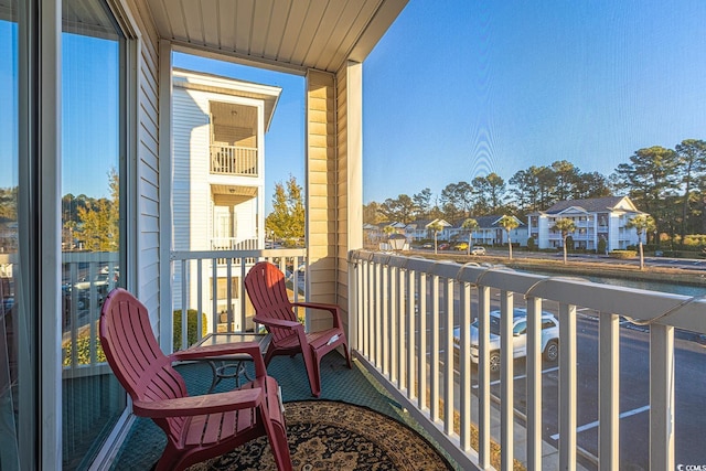 balcony featuring a residential view