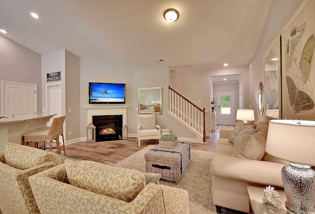 2038 Lone Cypress Dr, Myrtle Beach, SC 29579 - living room with vaulted ceiling and light hardwood / wood-style flooring