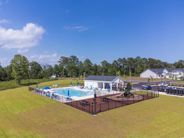 2038 Lone Cypress Dr, Myrtle Beach, SC 29579 - view of swimming pool with a lawn and a playground