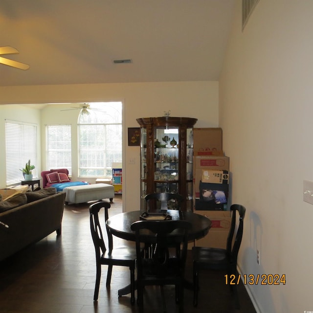 dining area featuring hardwood / wood-style flooring and ceiling fan