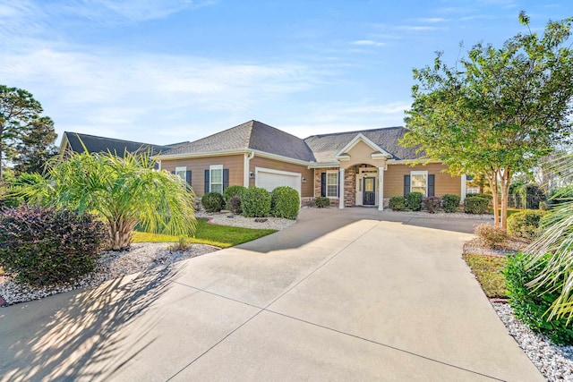 single story home featuring a garage