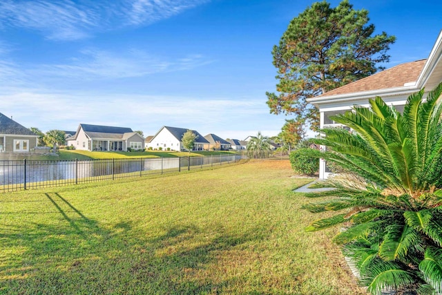 view of yard with a water view