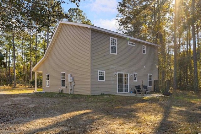 back of property featuring a patio area