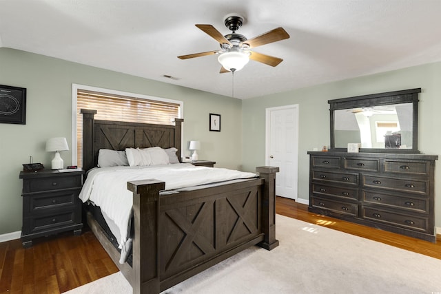 bedroom with ceiling fan and light wood-type flooring