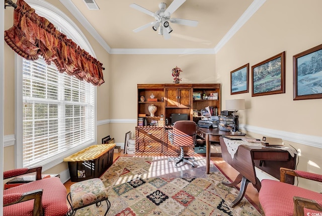 office space featuring crown molding, ceiling fan, and light wood-type flooring