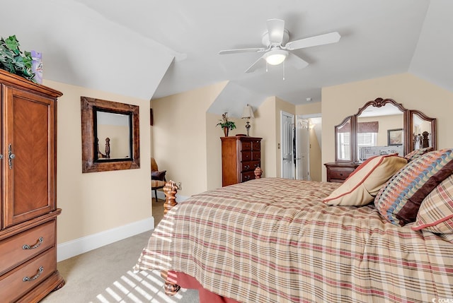 carpeted bedroom featuring ceiling fan and lofted ceiling