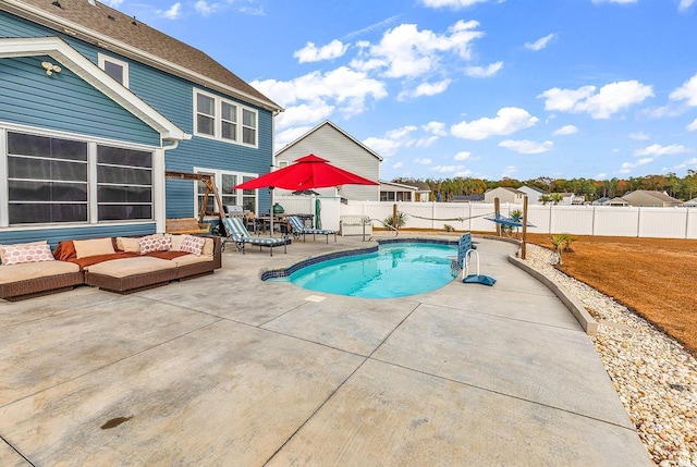 view of pool with a patio