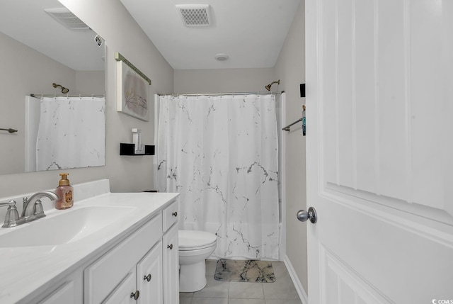 full bathroom featuring shower / bath combo with shower curtain, tile patterned flooring, vanity, and toilet