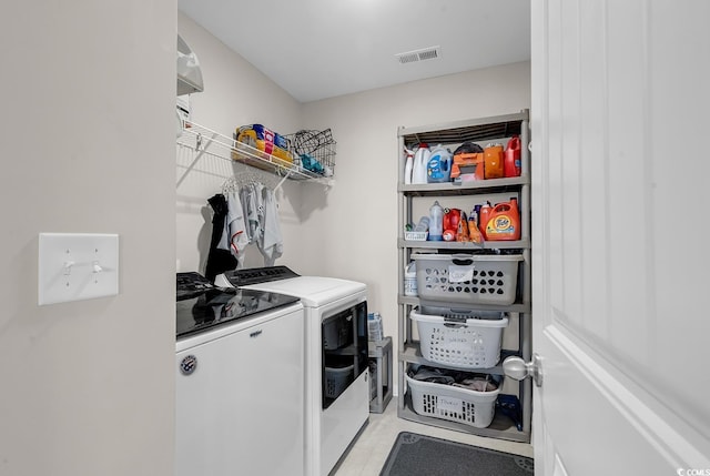 laundry room featuring independent washer and dryer