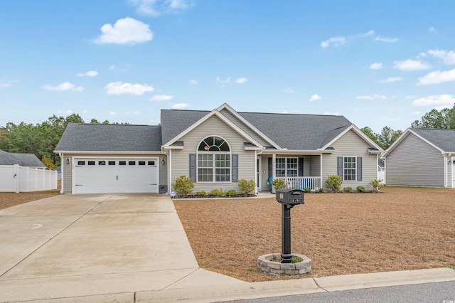 single story home with a porch and a garage