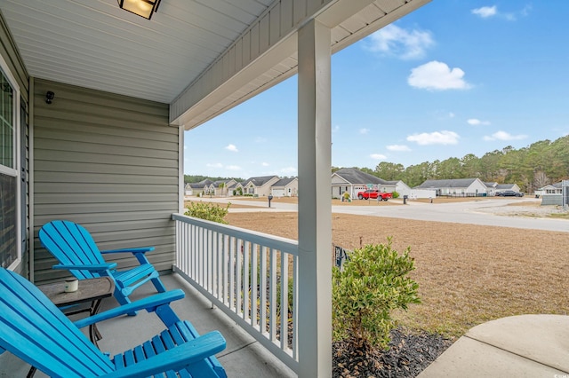 balcony featuring covered porch