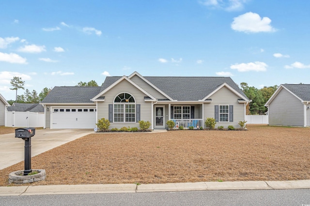 ranch-style house featuring a porch and a garage