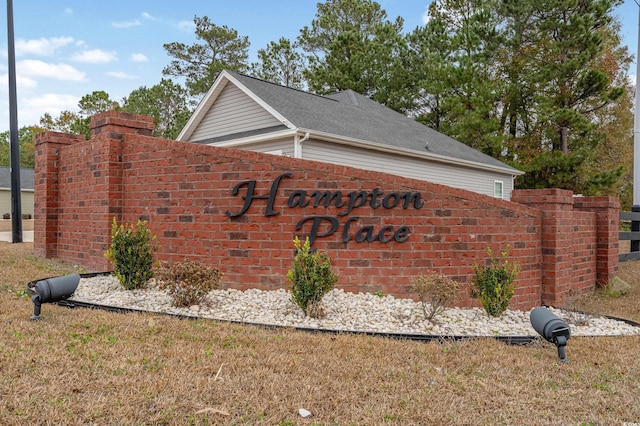 view of community sign