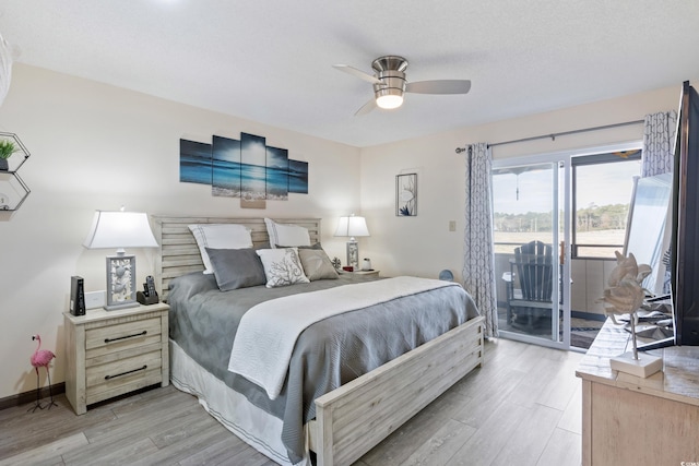 bedroom with access to exterior, ceiling fan, and light hardwood / wood-style floors