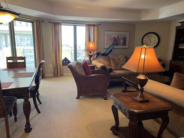 living room featuring light carpet and ornamental molding