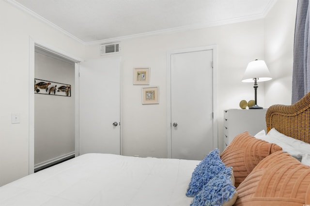 bedroom featuring crown molding