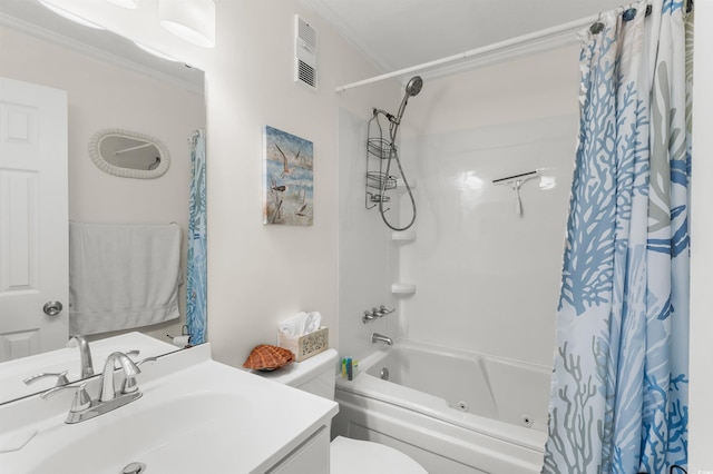 full bathroom featuring crown molding, vanity, shower / bath combination with curtain, and toilet