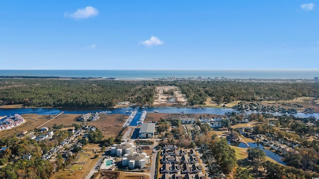 drone / aerial view with a water view