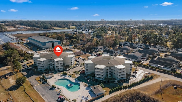 birds eye view of property featuring a water view