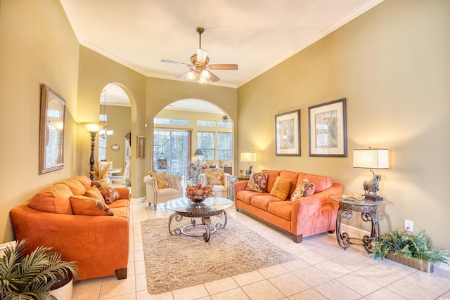 living room featuring light tile patterned floors, ceiling fan, and crown molding