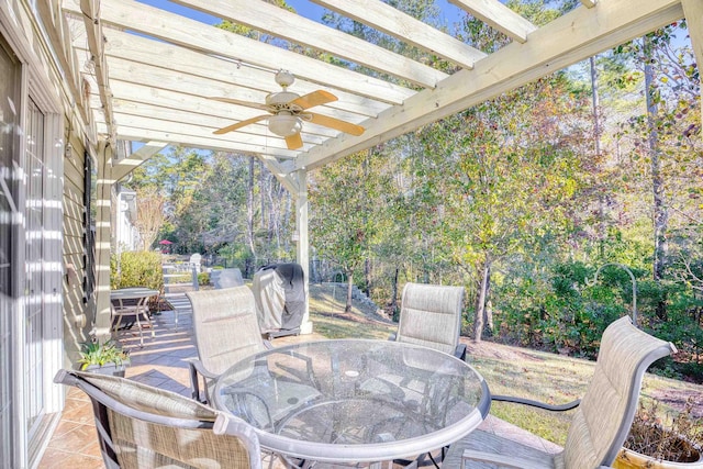 view of patio / terrace featuring ceiling fan