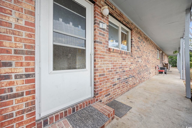 entrance to property with covered porch