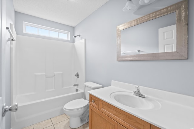 full bathroom featuring vanity, a textured ceiling, shower / washtub combination, tile patterned flooring, and toilet