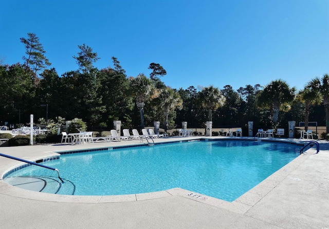 64 Summerlight Dr, Murrells Inlet, SC 29576 - pool with fence and a patio area