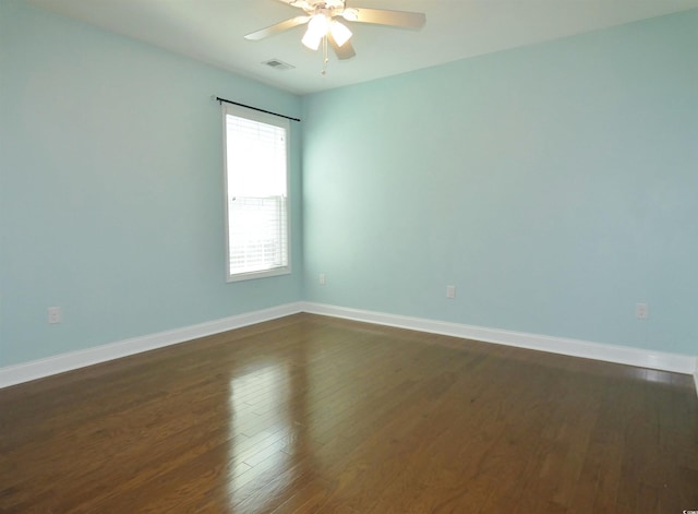 64 Summerlight Dr, Murrells Inlet, SC 29576 - spare room with baseboards, visible vents, ceiling fan, and dark wood-style flooring